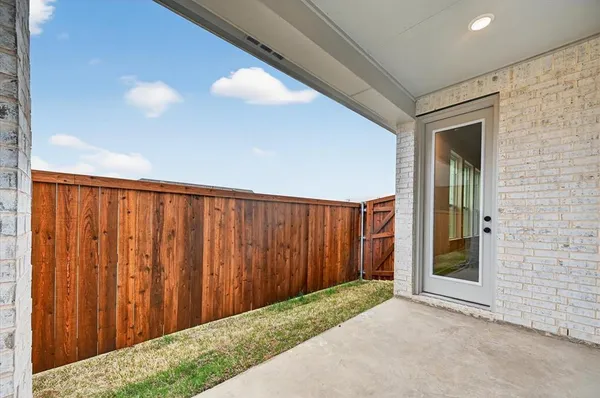 a view of a back yard from a hallway
