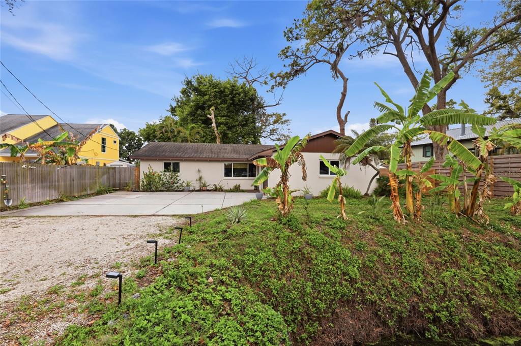 4576 Bliss Road Sarasota, FL 34233 - Photo 3 of 40 a view of a house with a yard