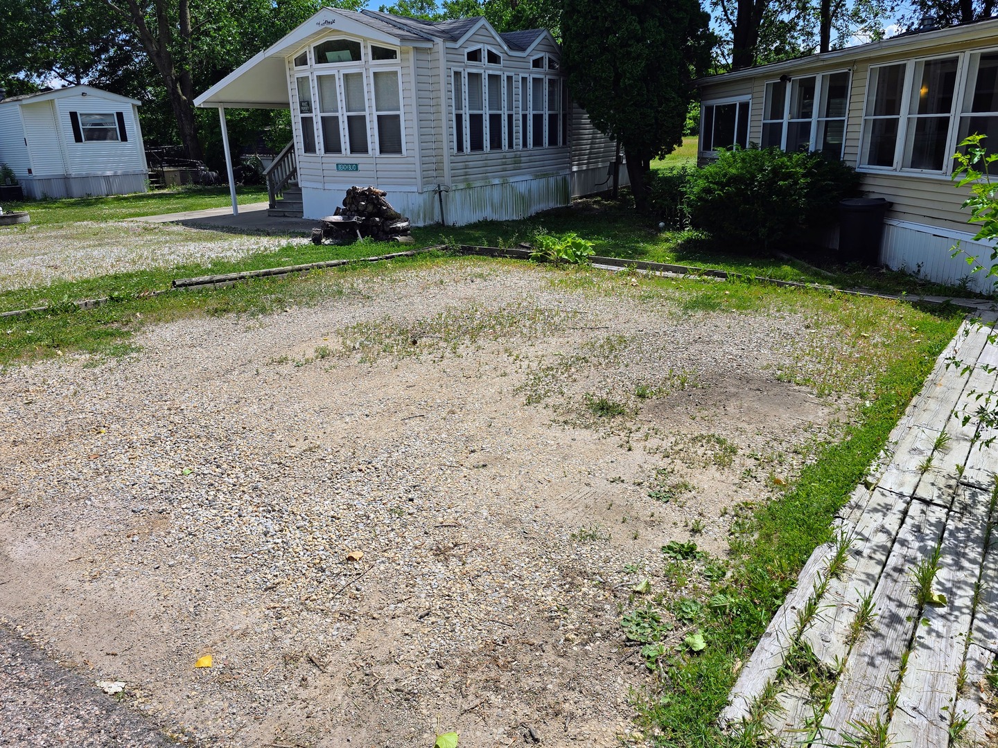 182 Windward Road Lakemoor, IL 60051 - Photo 14 of 22 a view of a house with backyard and garden