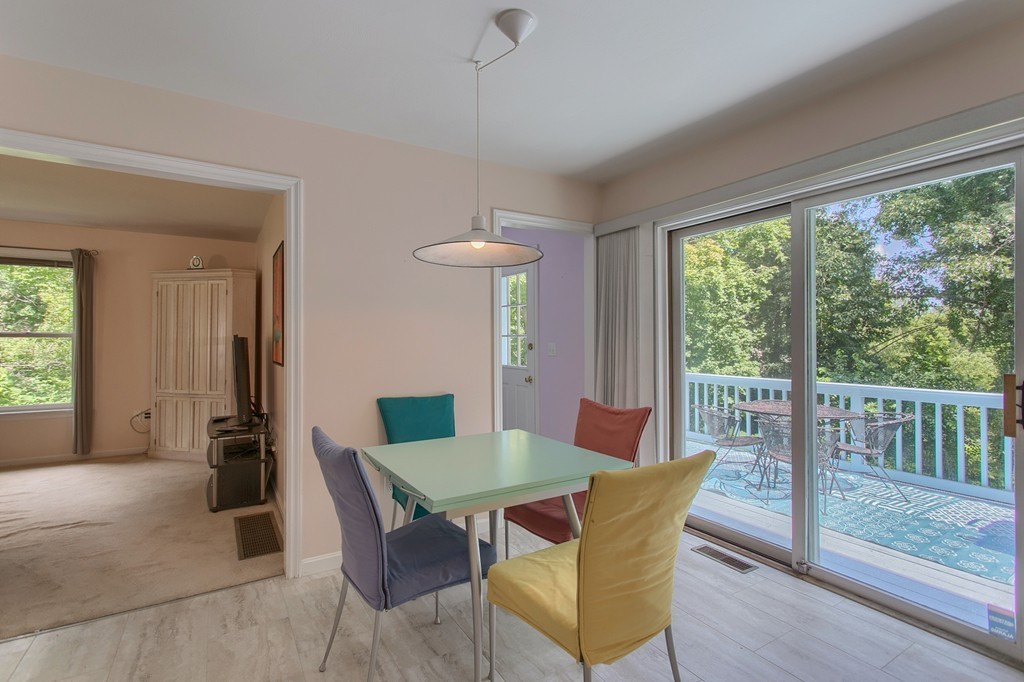 109 North Road Chelmsford, MA 01824 - Photo 12 of 30 a view of a dining room with furniture window and wooden floor