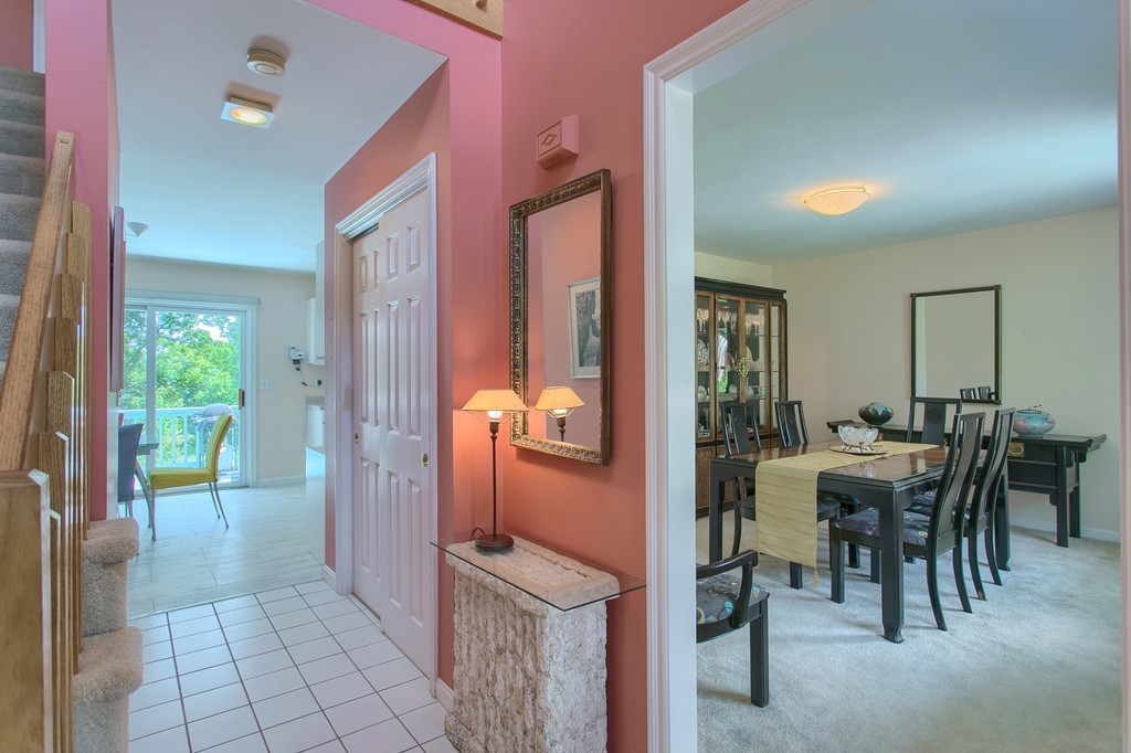 109 North Road Chelmsford, MA 01824 - Photo 15 of 30 a view of a dining area with furniture and chandelier