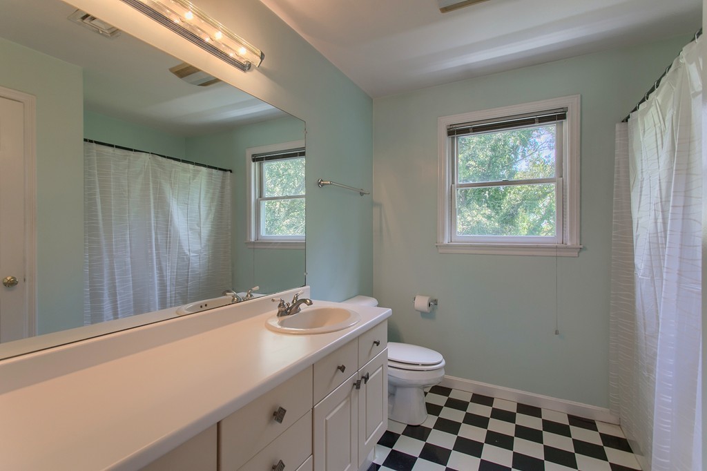 109 North Road Chelmsford, MA 01824 - Photo 22 of 30 a bathroom with a sink a toilet and shower