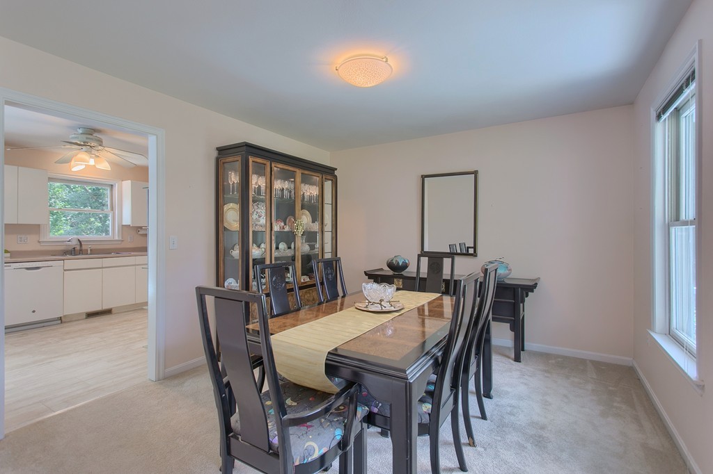 109 North Road Chelmsford, MA 01824 - Photo 6 of 30 a view of a dining room with furniture and window