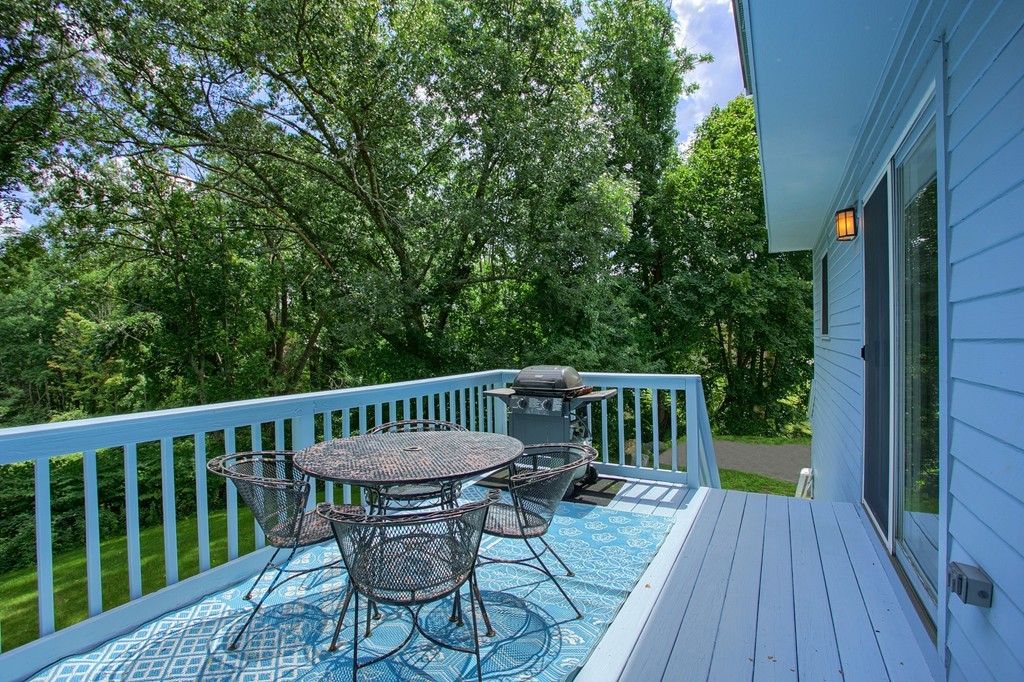 109 North Road Chelmsford, MA 01824 - Photo 8 of 30 a view of balcony with furniture and wooden deck