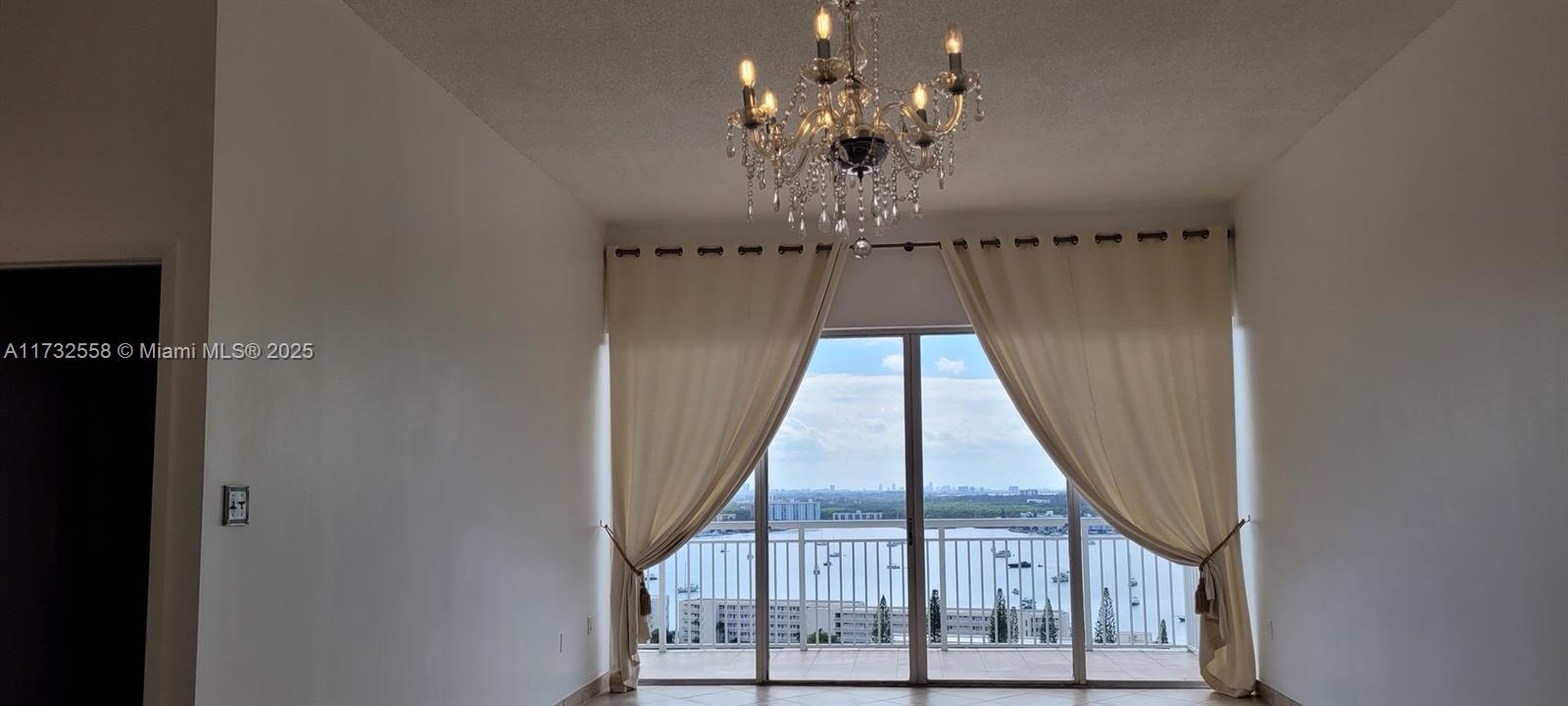 18031 Biscayne Boulevard, Unit PH03 Aventura, FL 33160 - Photo 11 of 21 a view of a balcony with an outdoor space