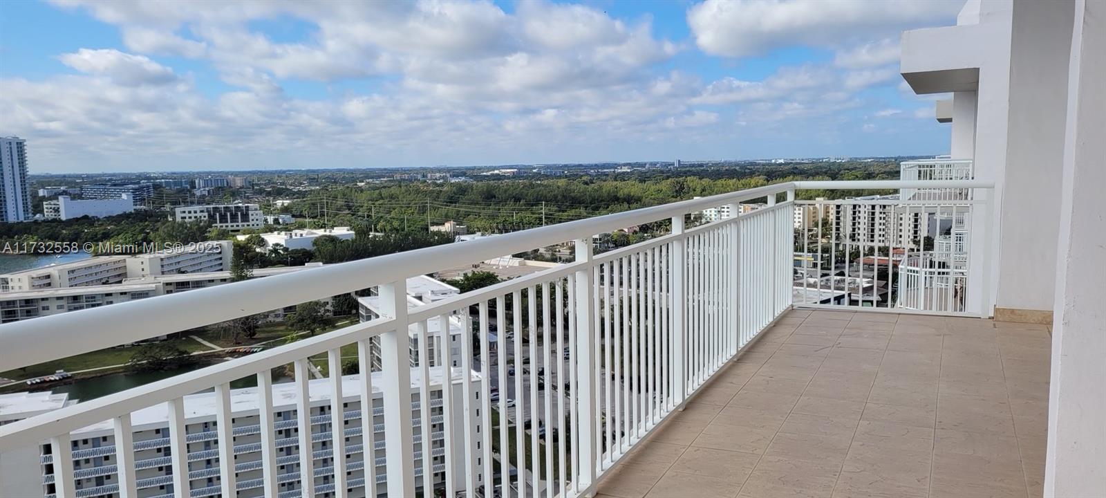 18031 Biscayne Boulevard, Unit PH03 Aventura, FL 33160 - Photo 17 of 21 a view of a balcony with city view
