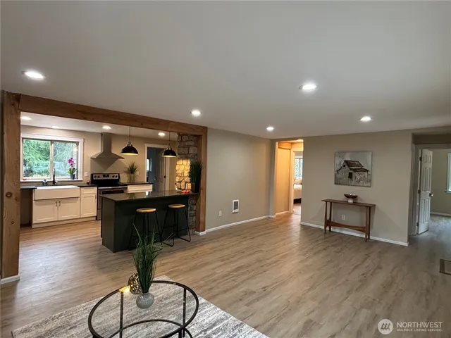 a view of livingroom with furniture and window