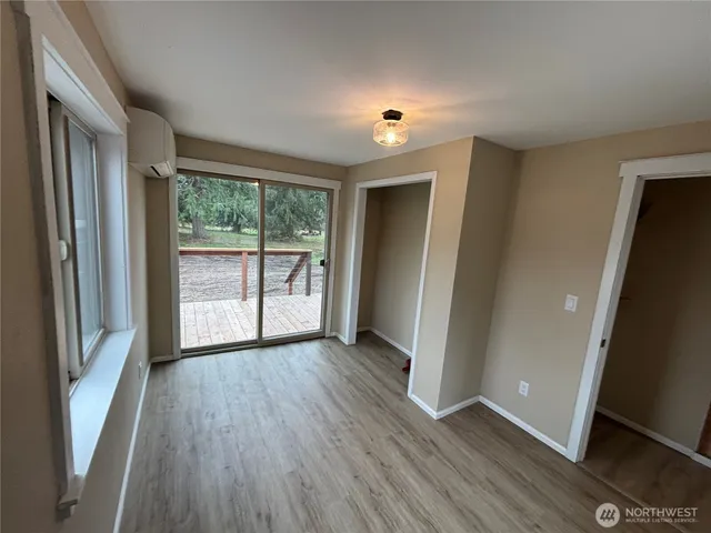 a view of a house with a yard and stairs
