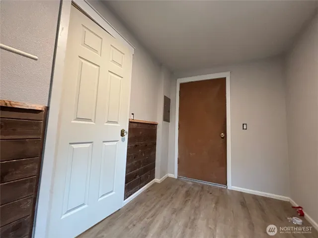 a swimming pool with outdoor seating and yard