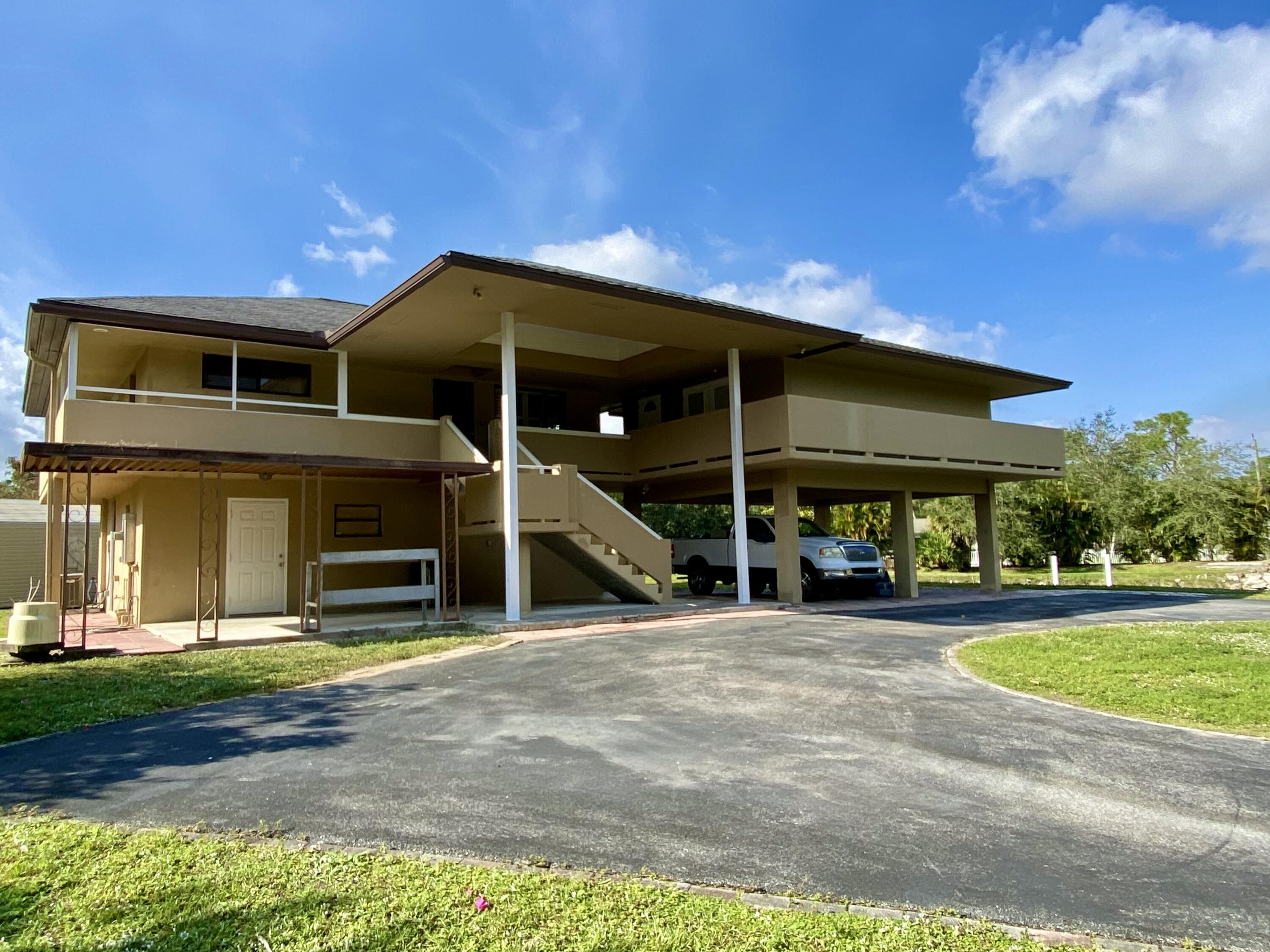 13640 153rd Road North Jupiter, FL 33478 - Photo 1 of 74 Front View
