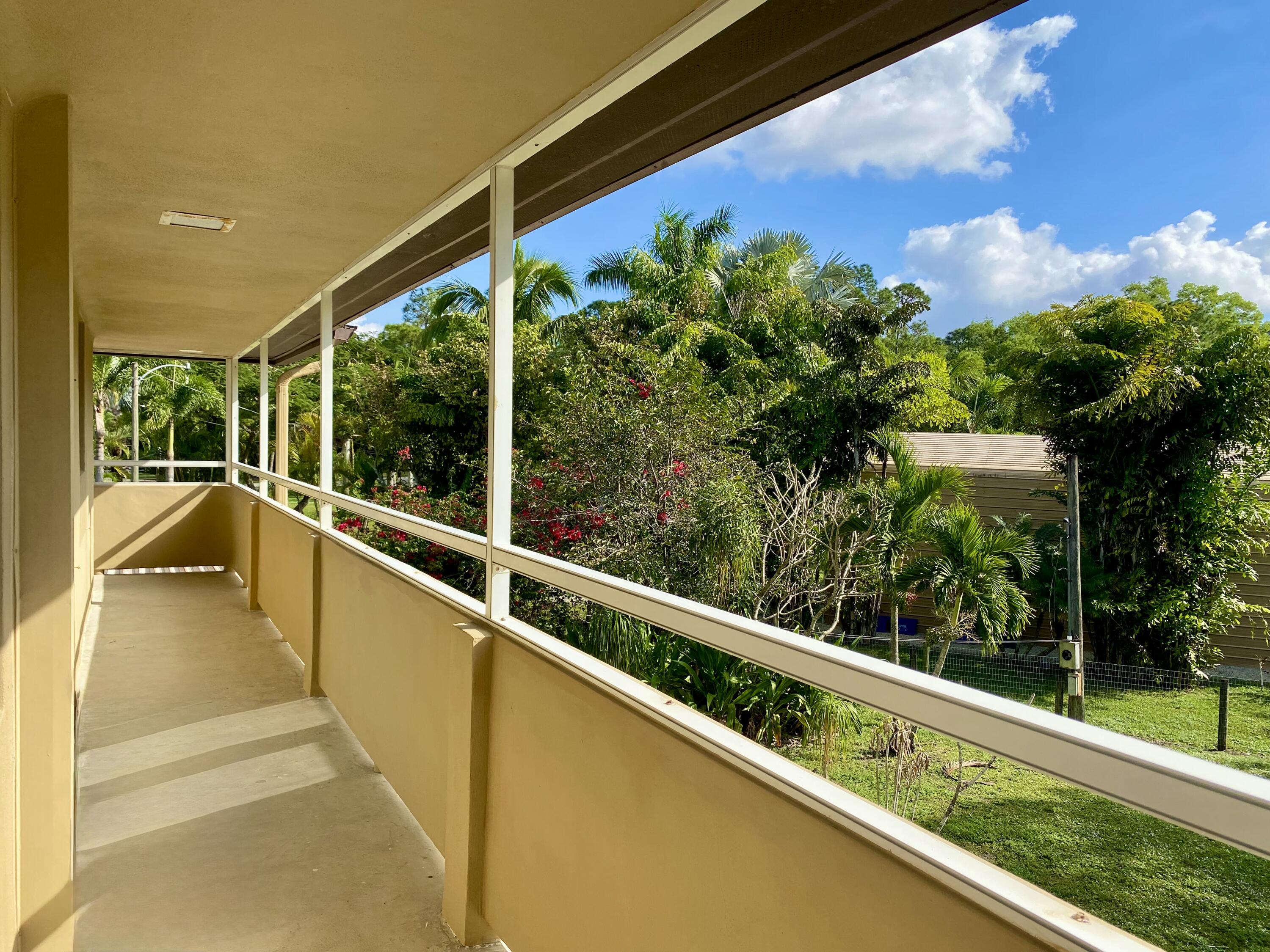 13640 153rd Road North Jupiter, FL 33478 - Photo 38 of 74 Wrap around porch