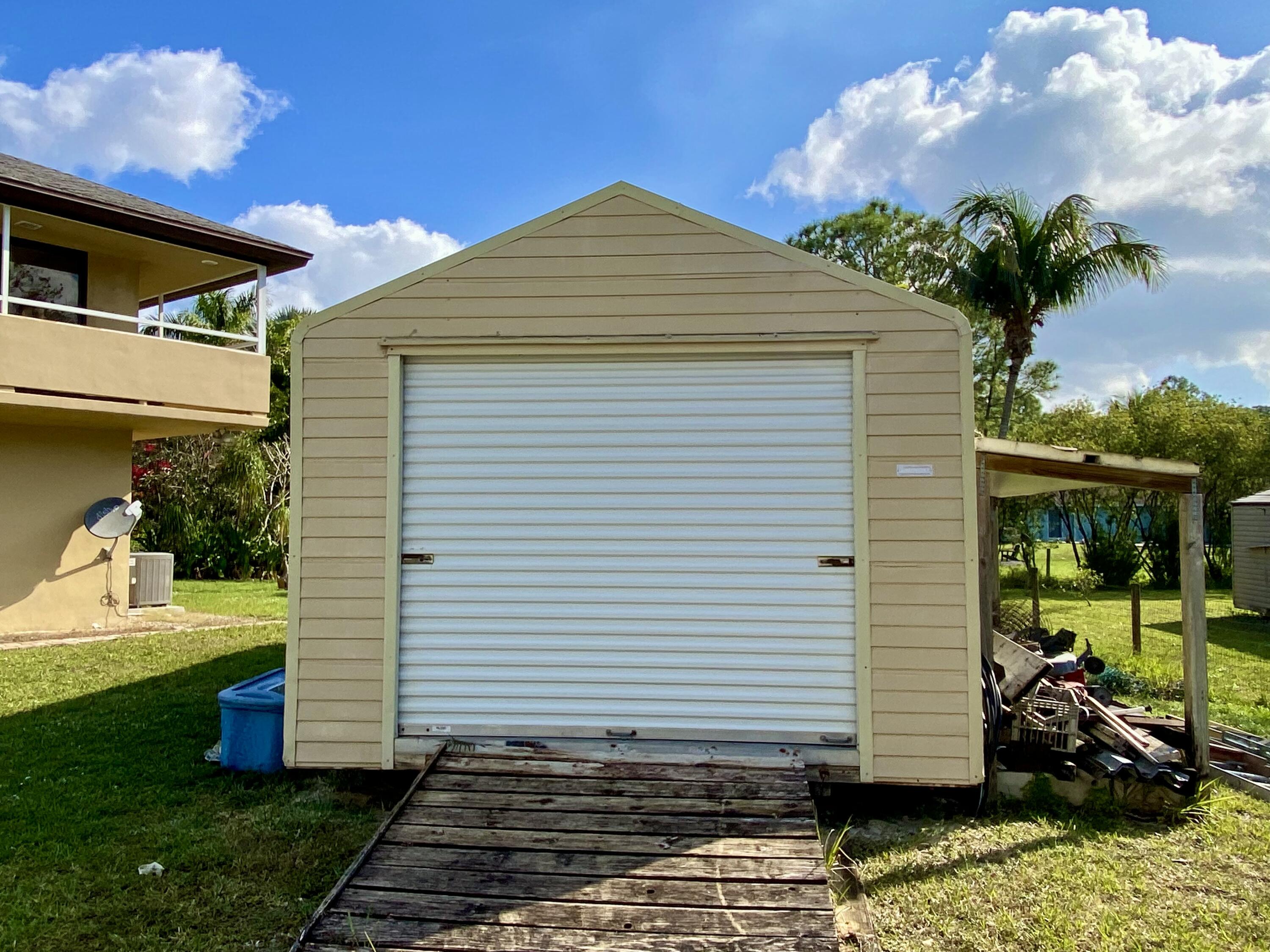13640 153rd Road North Jupiter, FL 33478 - Photo 70 of 74 Shed