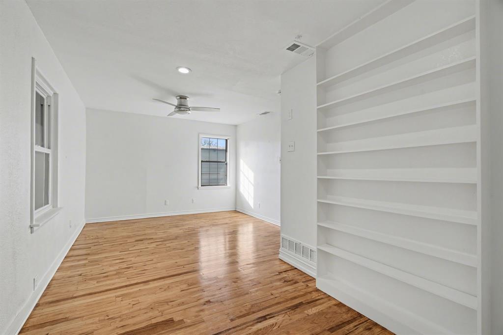 1714 East Union Bower Road Irving, TX 75061 - Photo 25 of 32 a view of empty room with wooden floor and fan