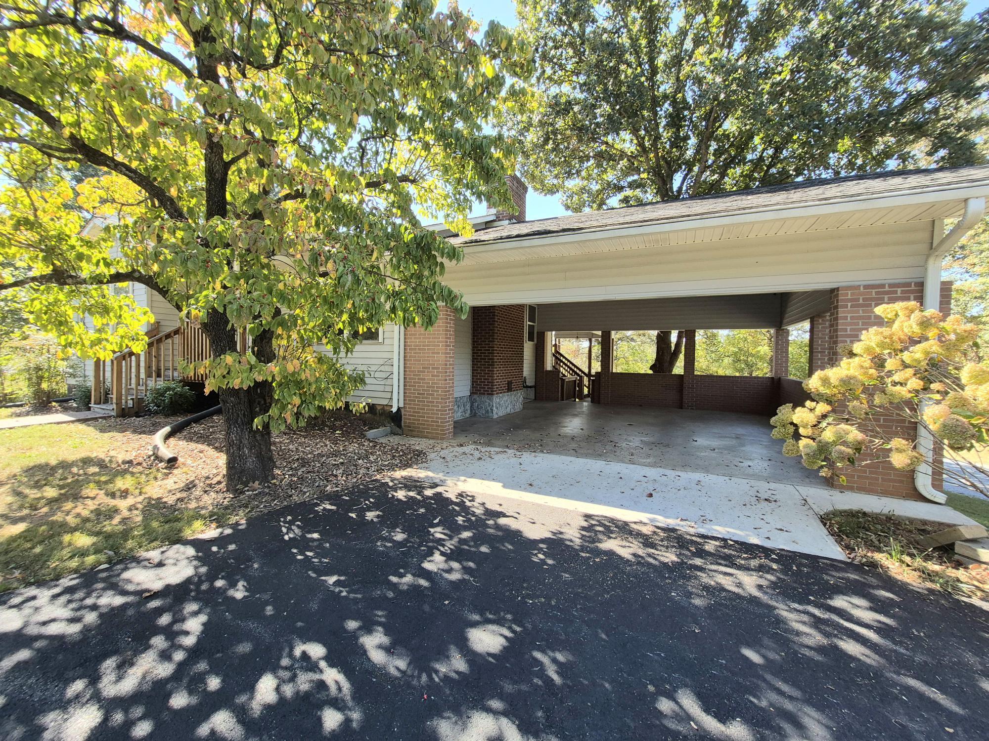 10048 Moneta Road Bedford, VA 24523 - Photo 12 of 51 a view of a yard with an outdoor space