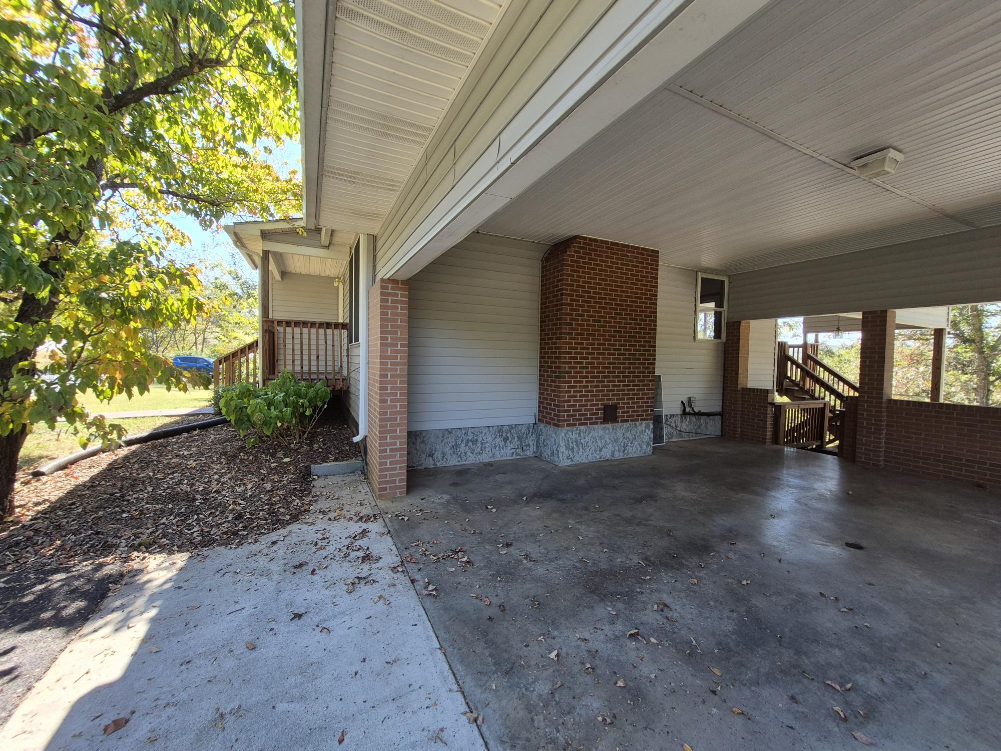 10048 Moneta Road Bedford, VA 24523 - Photo 22 of 51 a view of a house with a yard