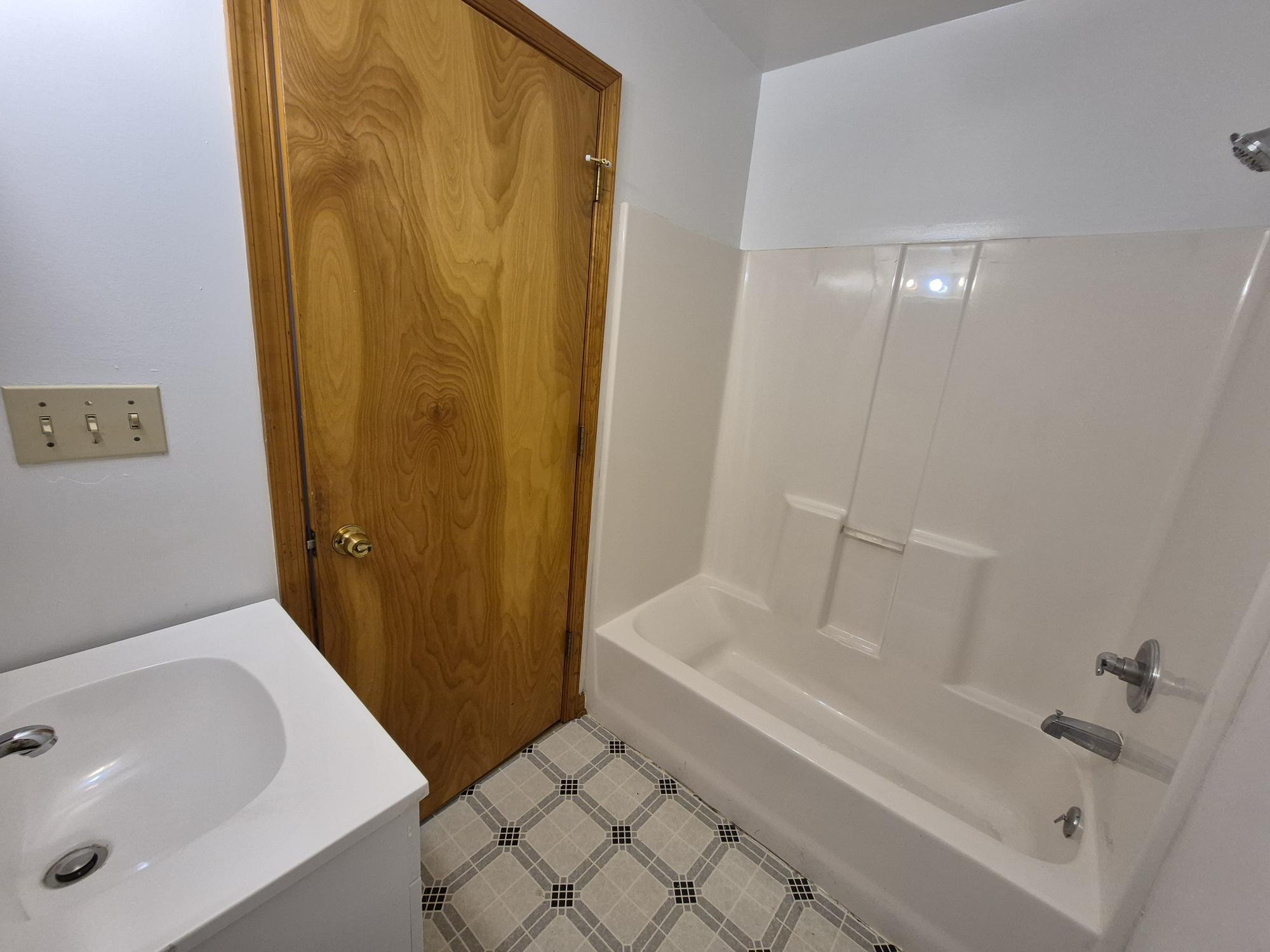 10048 Moneta Road Bedford, VA 24523 - Photo 35 of 51 a bathroom with a tub and shower