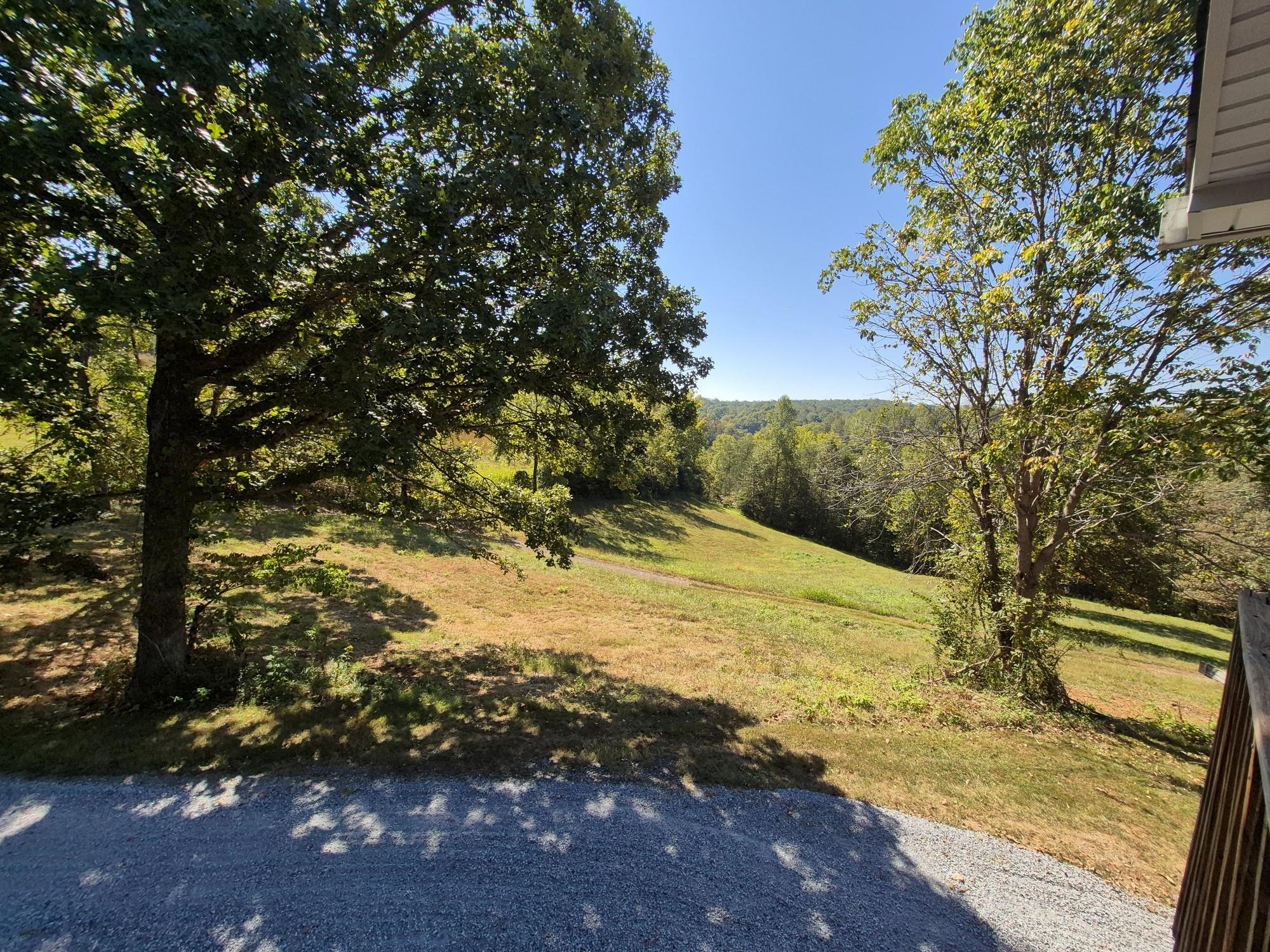 10048 Moneta Road Bedford, VA 24523 - Photo 40 of 51 a view of a yard with wooden fence