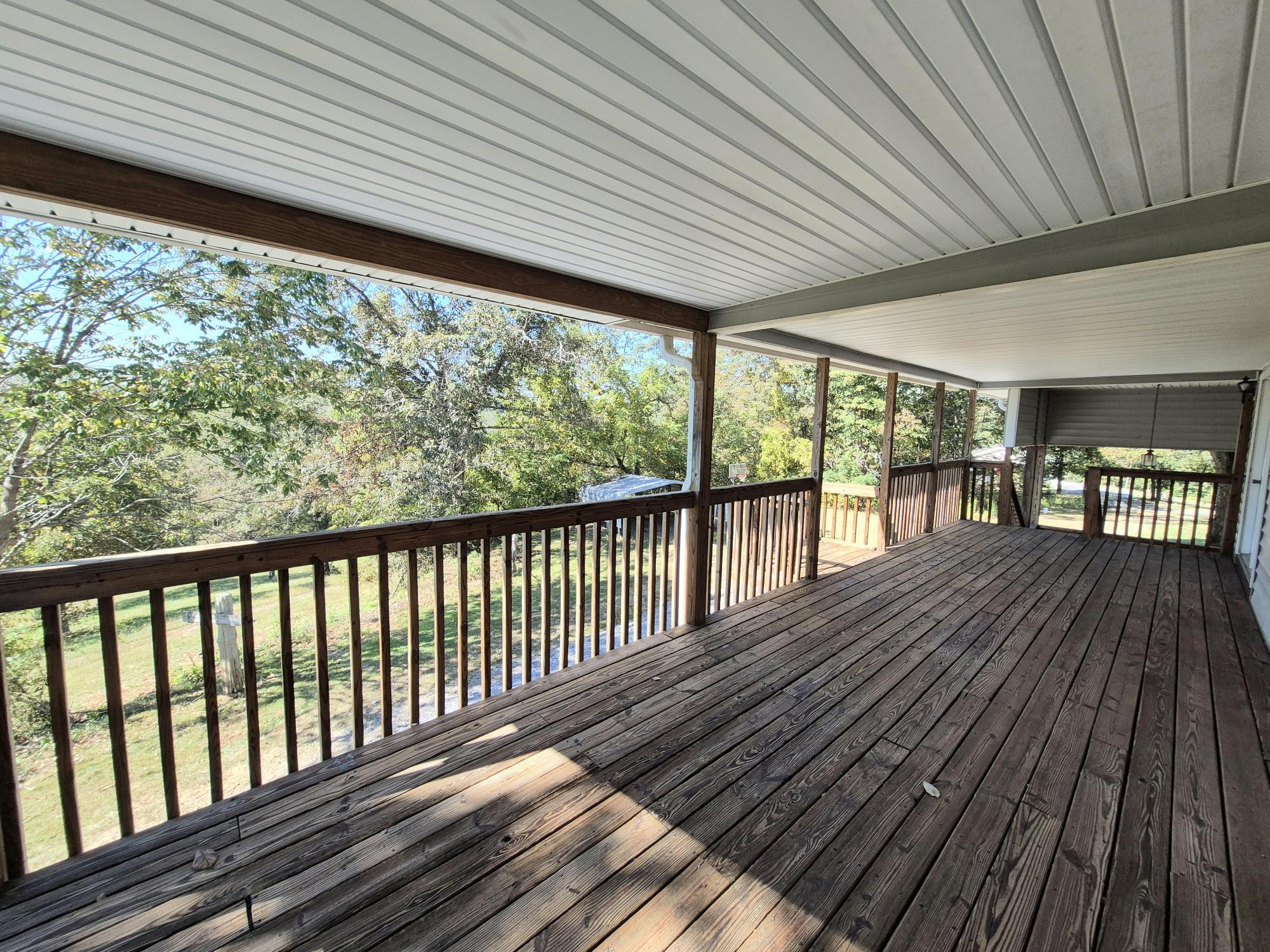 10048 Moneta Road Bedford, VA 24523 - Photo 41 of 51 a view of a balcony with wooden floor