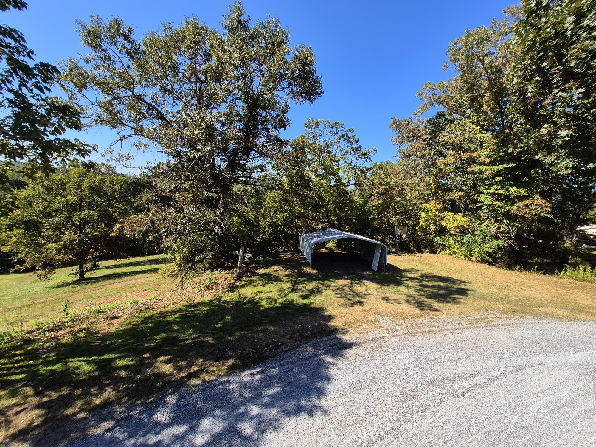 10048 Moneta Road Bedford, VA 24523 - Photo 42 of 51 a view of a yard with an outdoor space