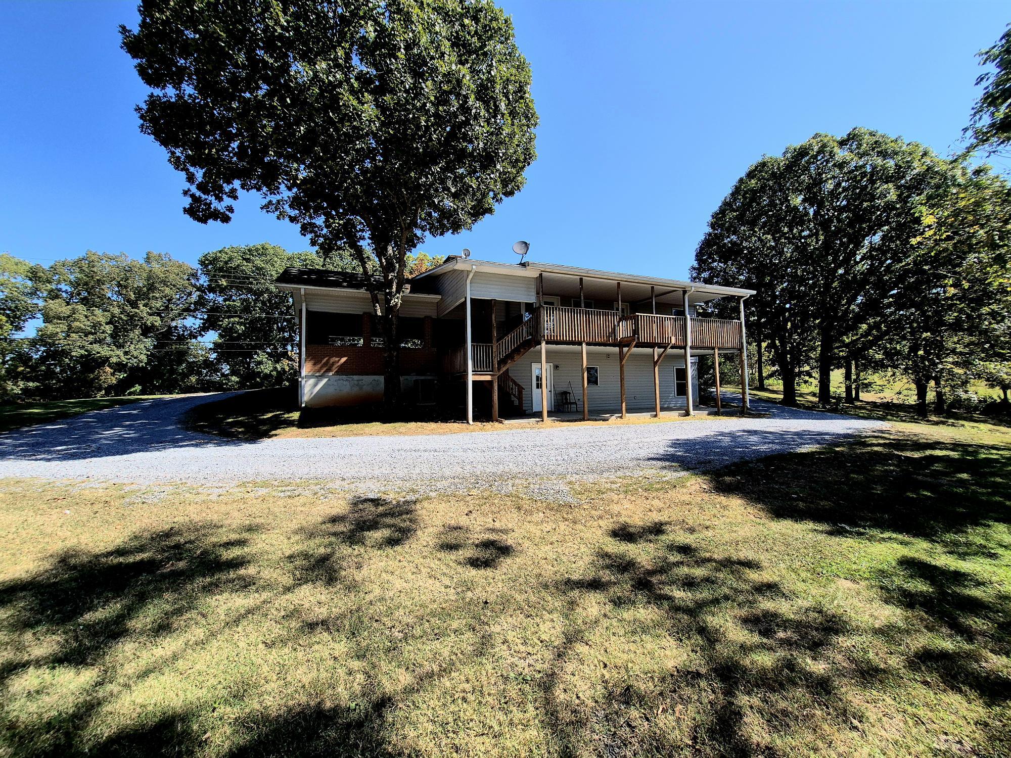 10048 Moneta Road Bedford, VA 24523 - Photo 48 of 51 a view of a house with a yard