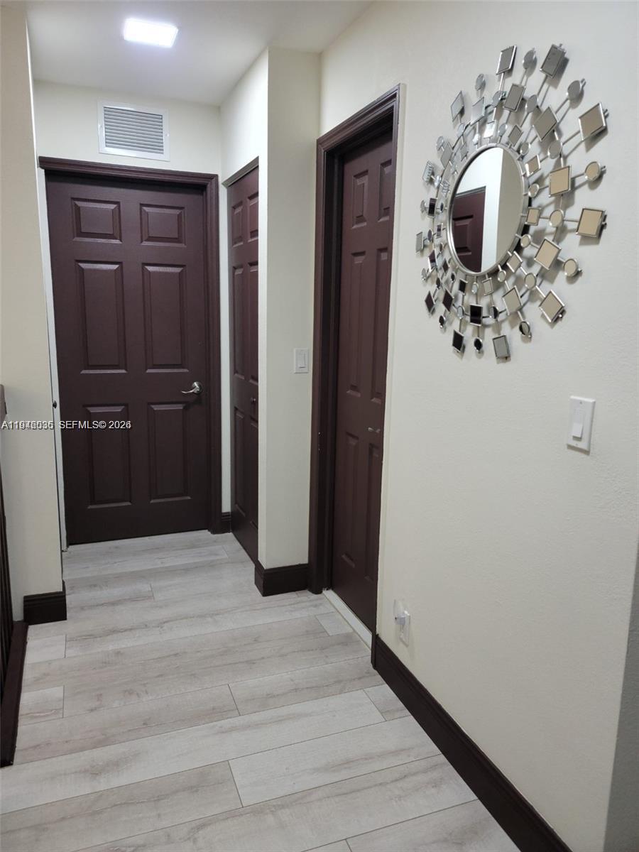 17401 Southwest 140th Court Miami, FL 33177 - Photo 24 of 42 a bathroom with a sink and mirror