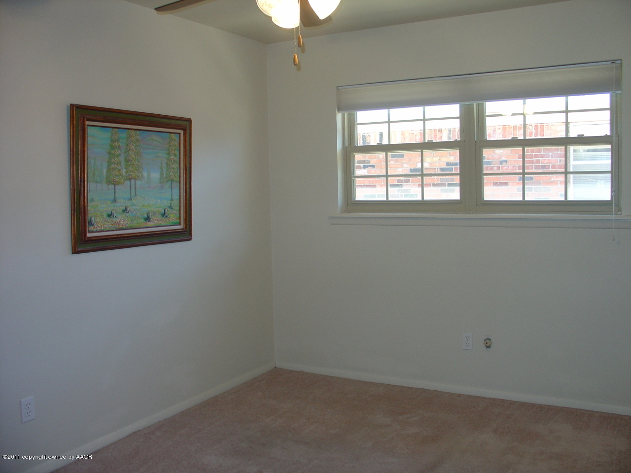 3306 Bedford Road Amarillo, TX 79106 - Photo 13 of 19 an empty room with a window