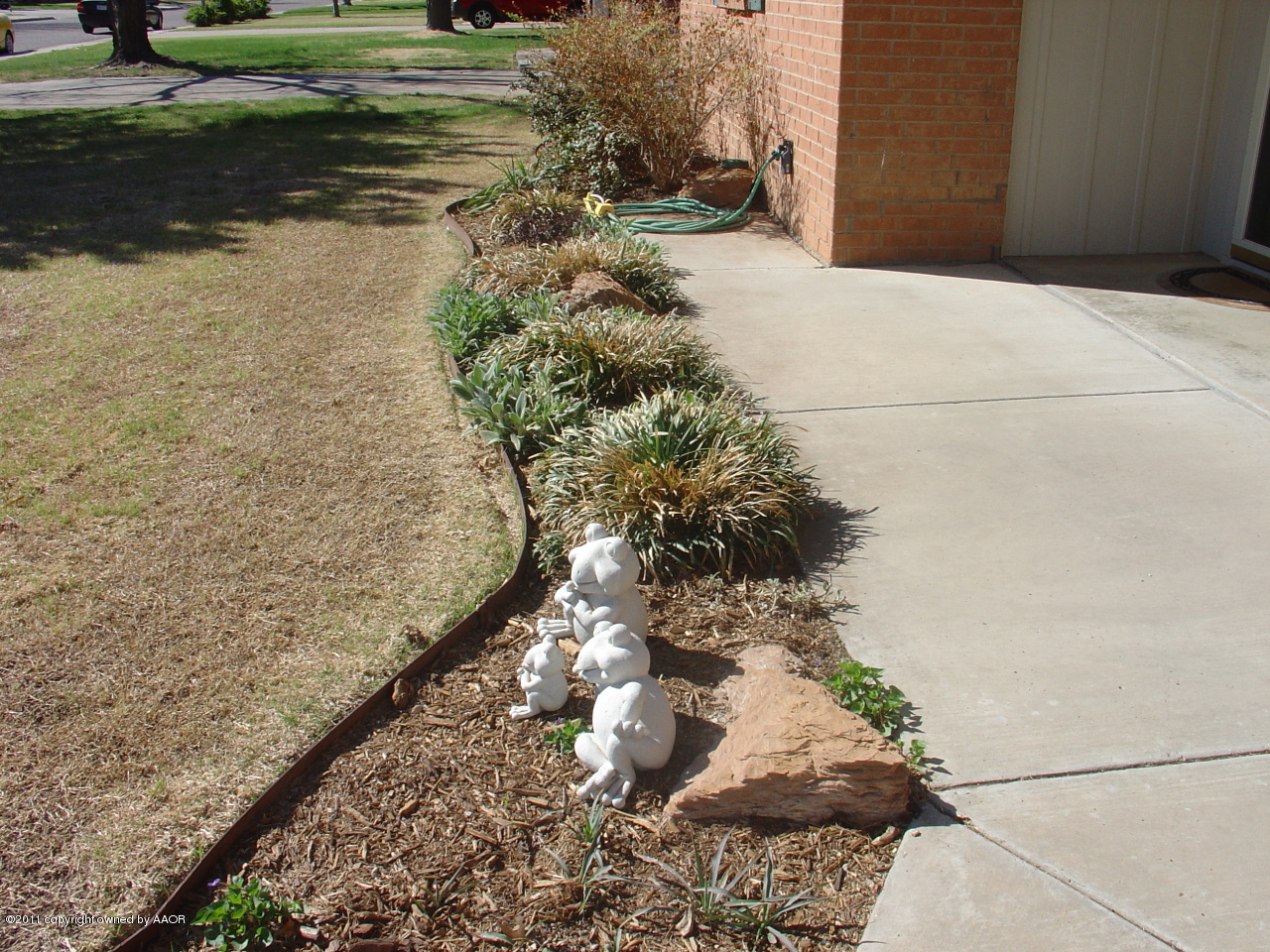 3306 Bedford Road Amarillo, TX 79106 - Photo 15 of 19 a view of a yard with plants