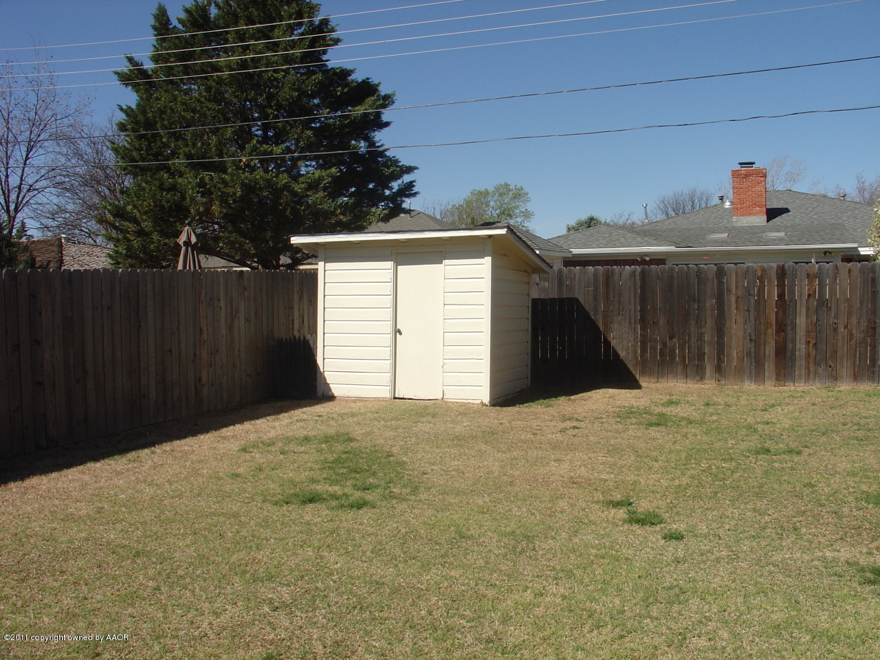 3306 Bedford Road Amarillo, TX 79106 - Photo 18 of 19 a backyard of a house