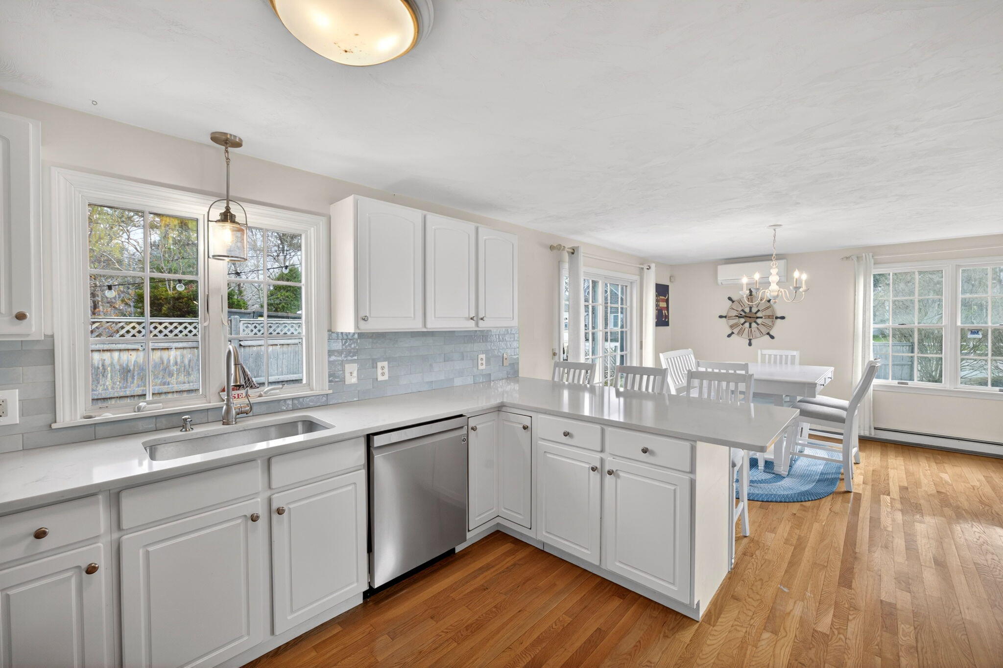 35 Pine Tree Road South Chatham, MA 02659 - Photo 12 of 39 a kitchen with a sink cabinets and wooden floor