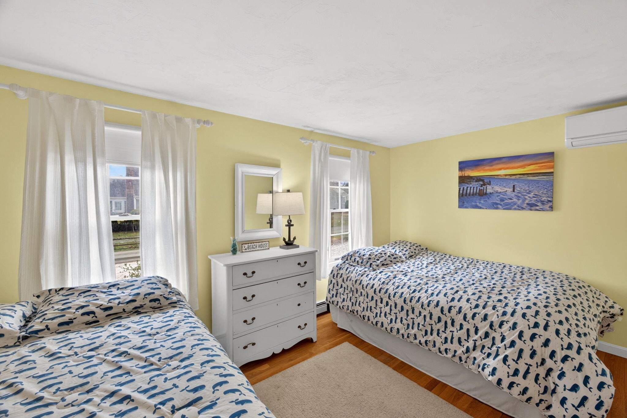 35 Pine Tree Road South Chatham, MA 02659 - Photo 14 of 39 a bedroom with a bed and wooden floor