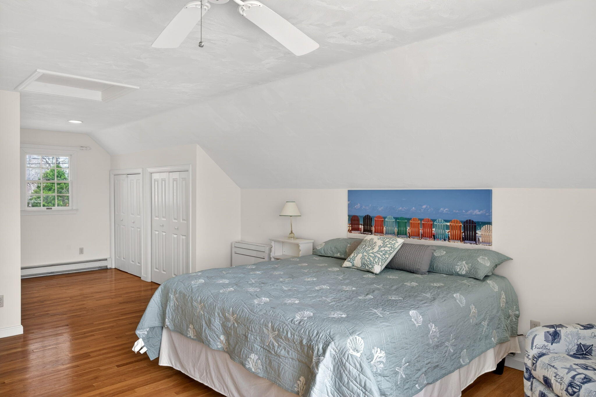 35 Pine Tree Road South Chatham, MA 02659 - Photo 19 of 39 a bedroom with a bed and painting on the wall