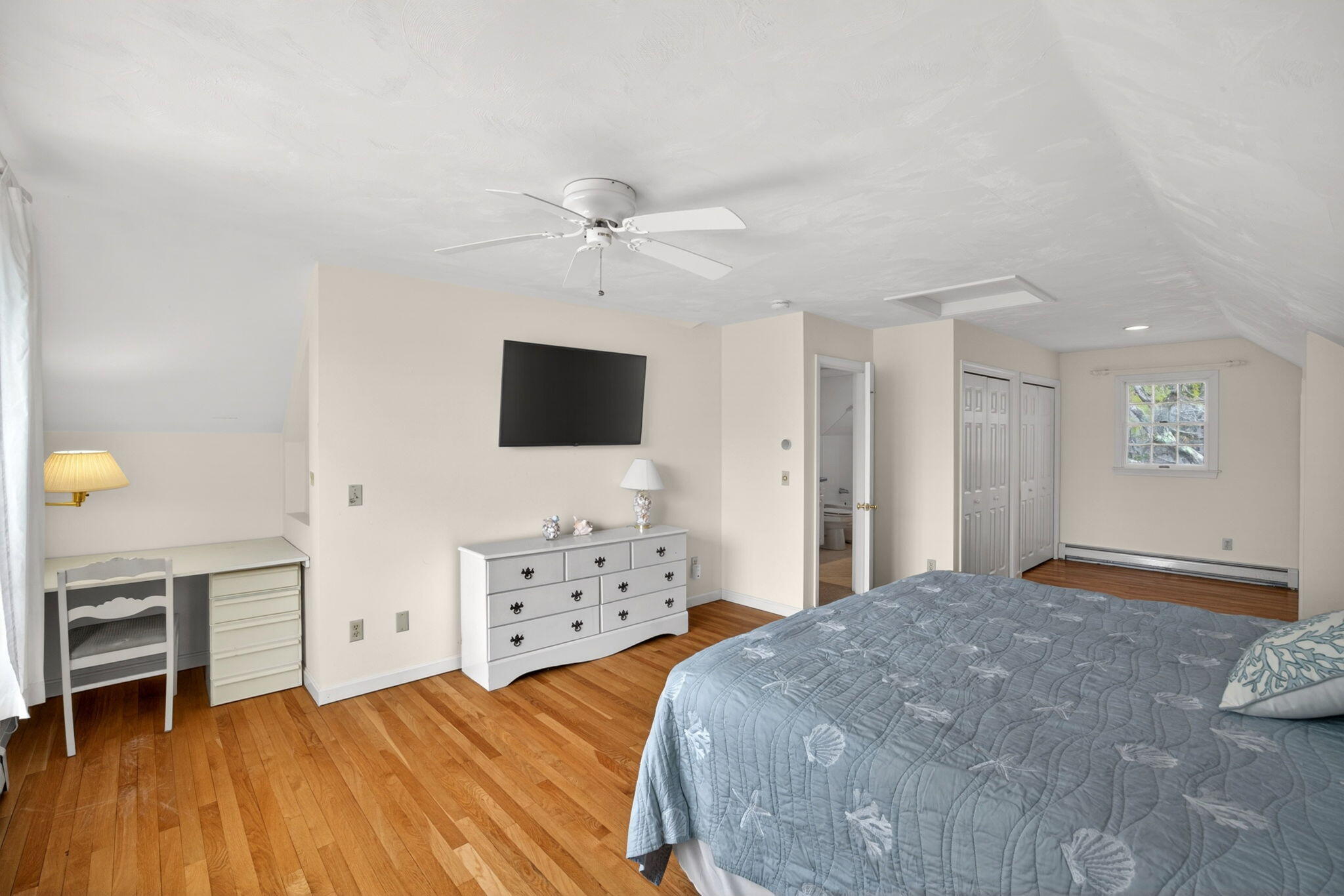 35 Pine Tree Road South Chatham, MA 02659 - Photo 21 of 39 a bedroom with a bed and a flat screen tv