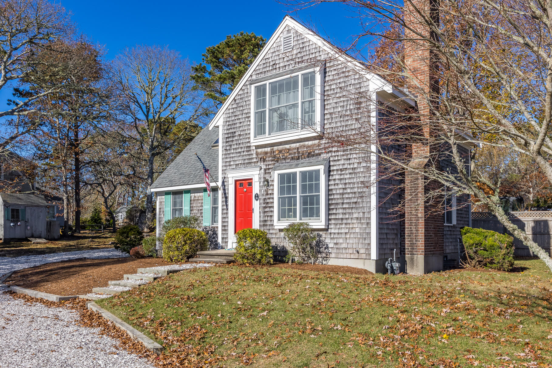 35 Pine Tree Road South Chatham, MA 02659 - Photo 32 of 39 a front view of a house with a yard