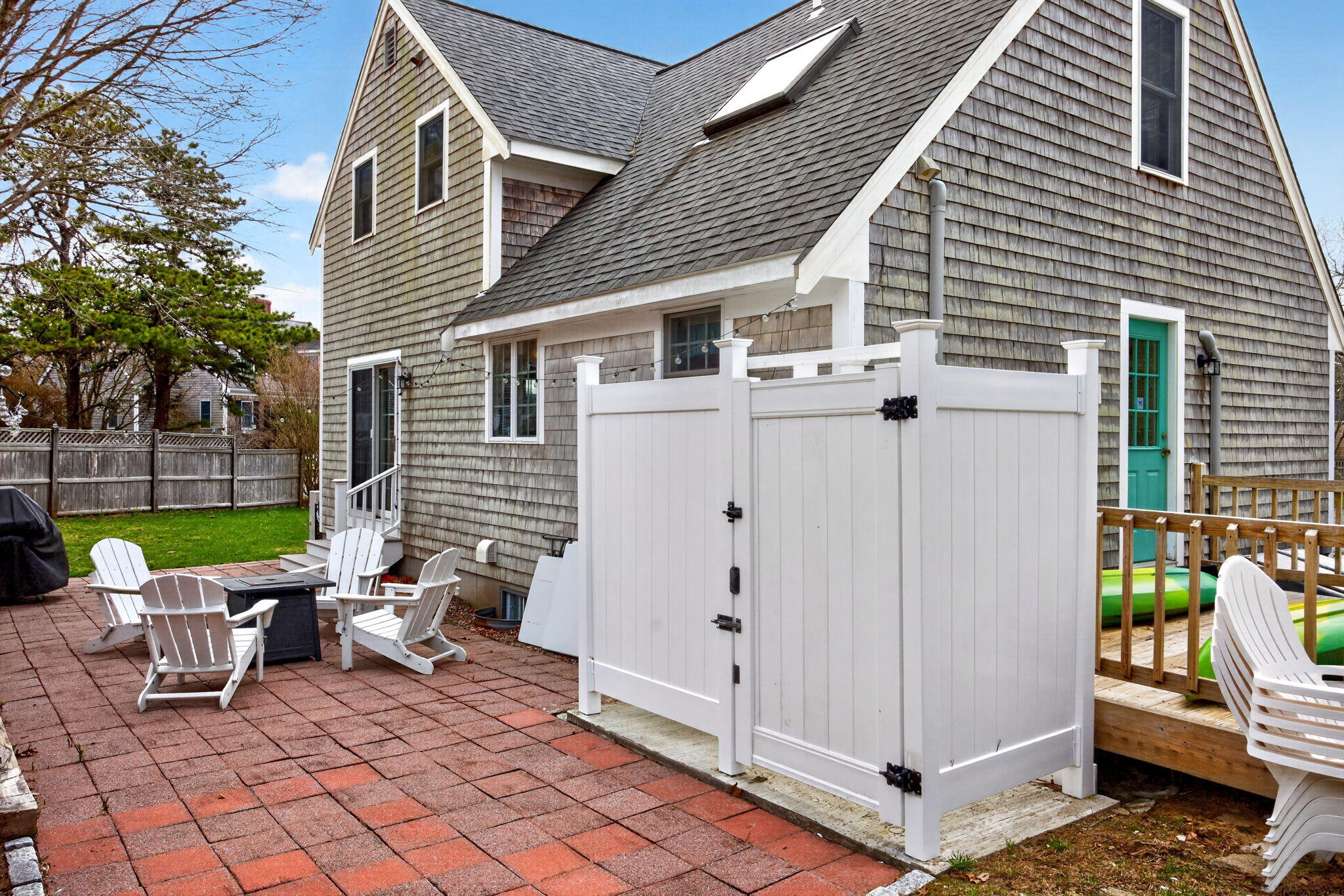 35 Pine Tree Road South Chatham, MA 02659 - Photo 35 of 39 a view of a patio with a table and chairs