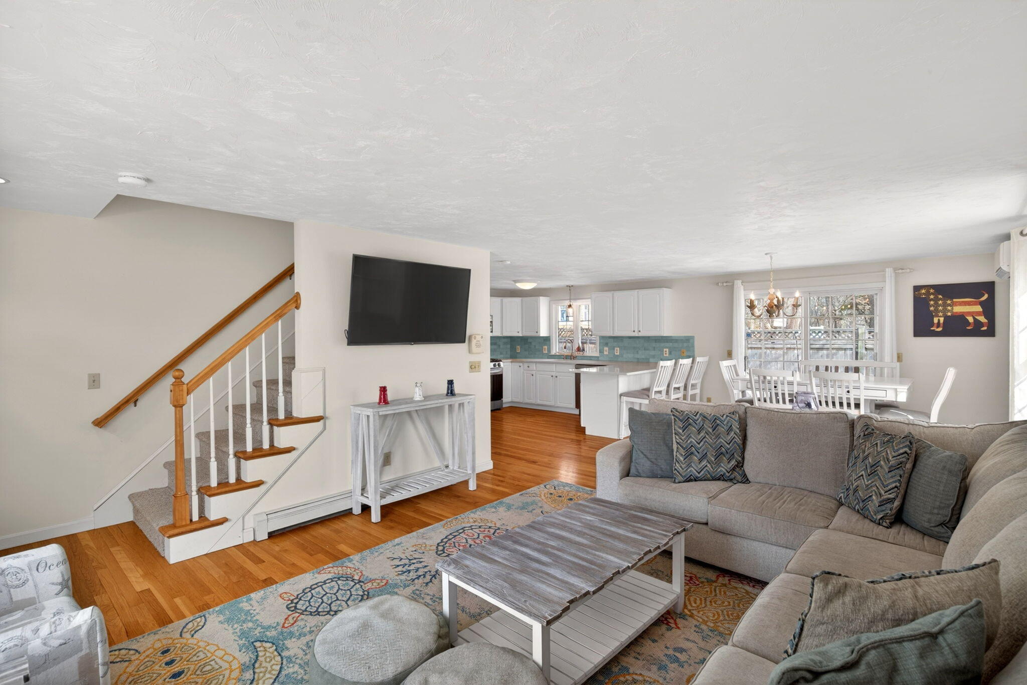 35 Pine Tree Road South Chatham, MA 02659 - Photo 5 of 39 a living room with furniture flat screen tv and a couch