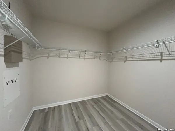 a view of a room with racks on the wall