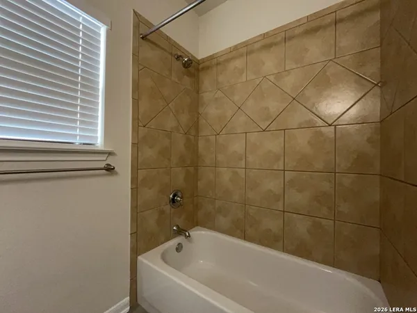 a bathroom with a bathtub