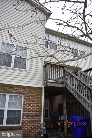 a front view of a building with an outdoor space