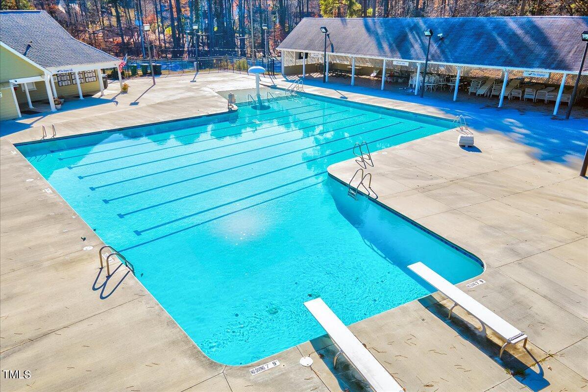 11925 Fairlie Place Raleigh, NC 27613 - Photo 18 of 22 swimming pool view with a outdoor seating