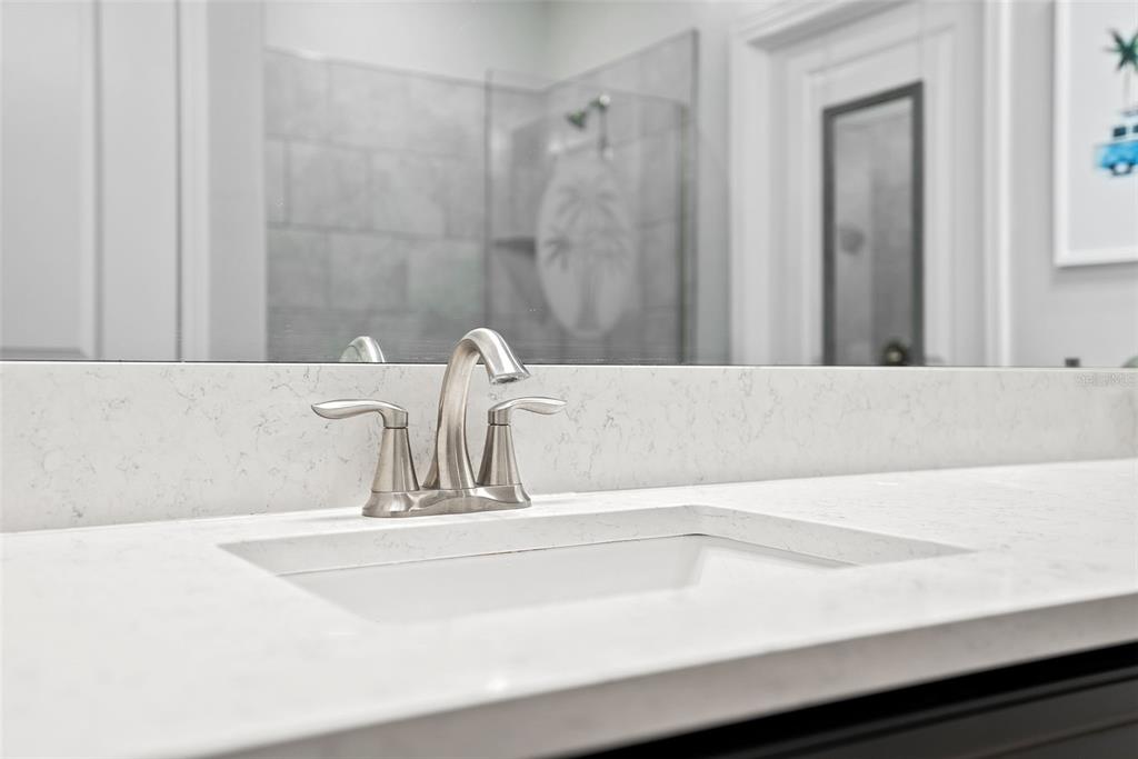 10232 Echo Dock Loop San Antonio, FL 33576 - Photo 25 of 43 a bathroom with a sink