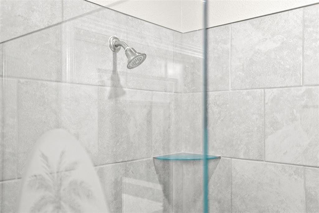 10232 Echo Dock Loop San Antonio, FL 33576 - Photo 27 of 43 a bathroom with a shower