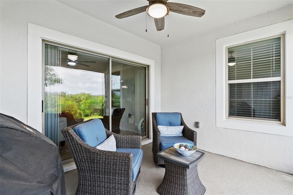 10232 Echo Dock Loop San Antonio, FL 33576 - Photo 35 of 43 a view of a livingroom with furniture and a window