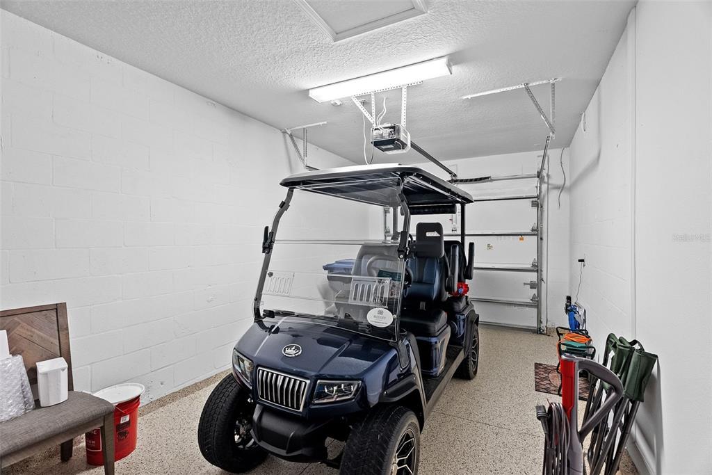 10232 Echo Dock Loop San Antonio, FL 33576 - Photo 36 of 43 a view of storage and utility room with racks on the wall