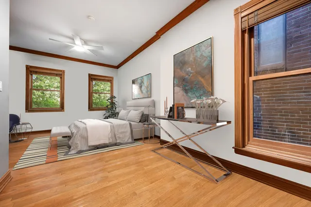 a living room with furniture and windows