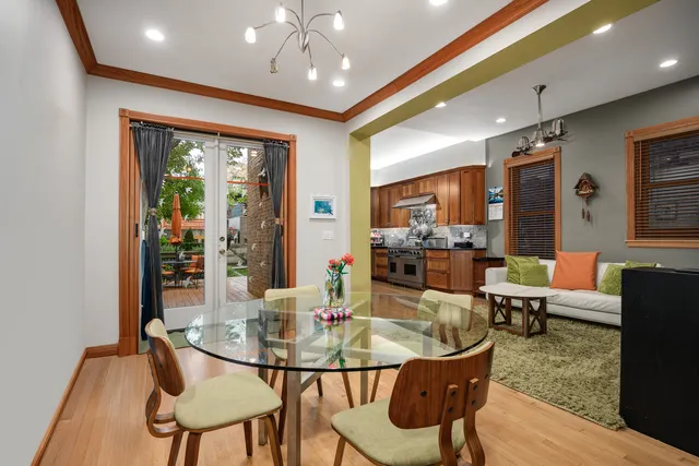 a view of a dining room with furniture window and outside view