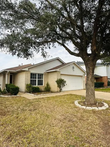 a house with trees in the background