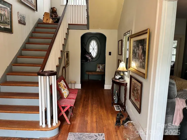 a view of stairs and with wooden floor