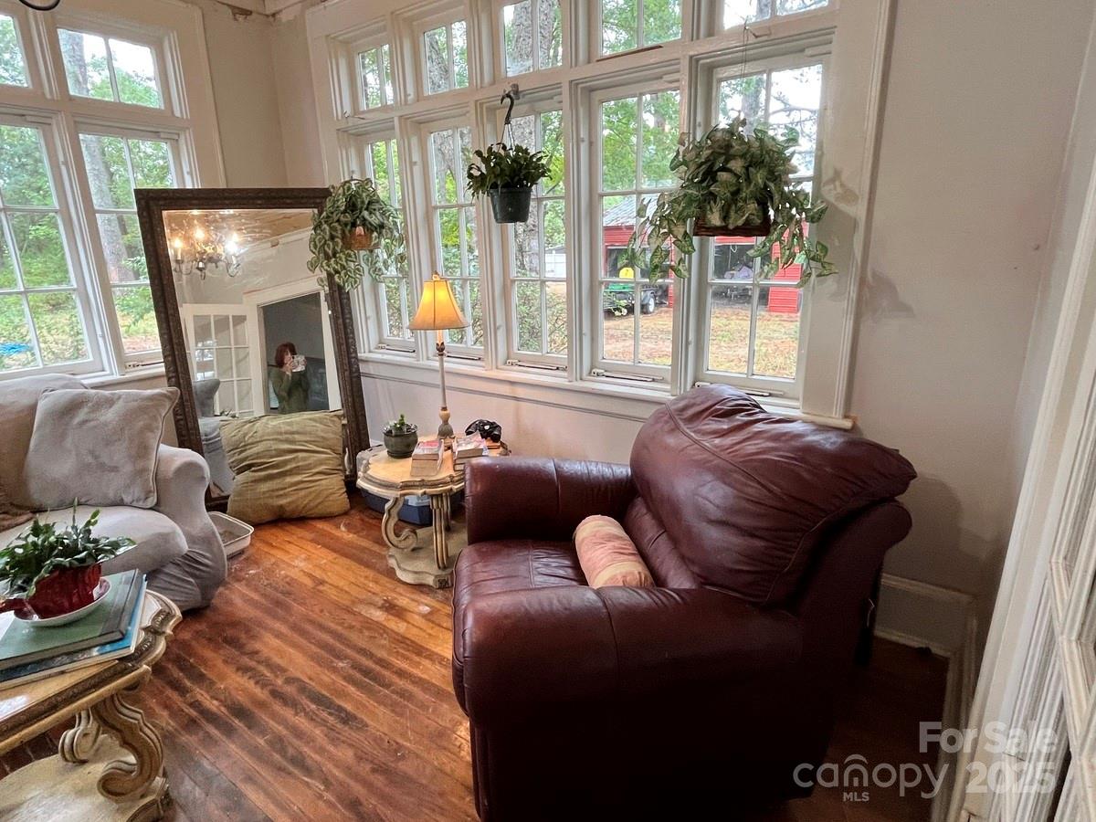 423 East Main Street Conway, NC 27820 - Photo 31 of 44 a living room with furniture and a fireplace