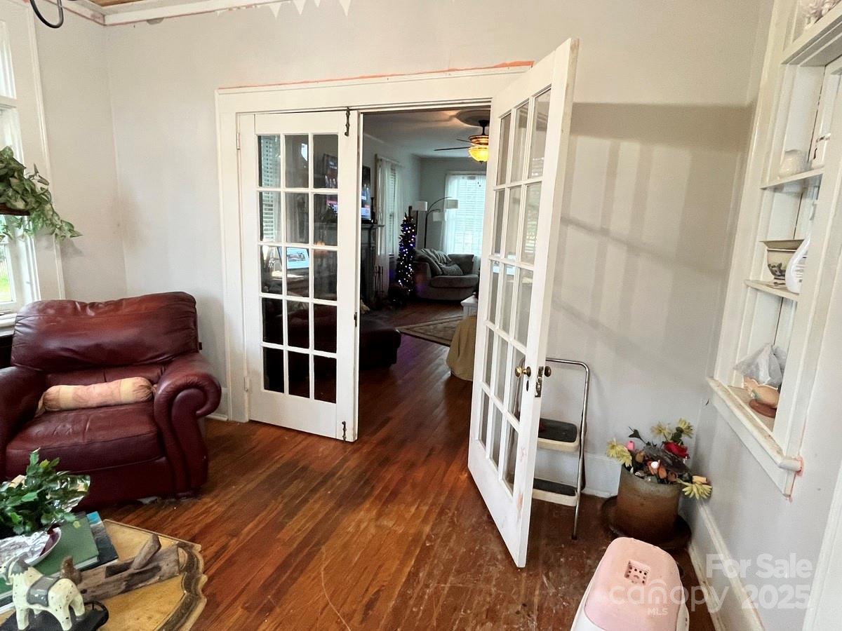 423 East Main Street Conway, NC 27820 - Photo 32 of 44 a living room with furniture and a fireplace