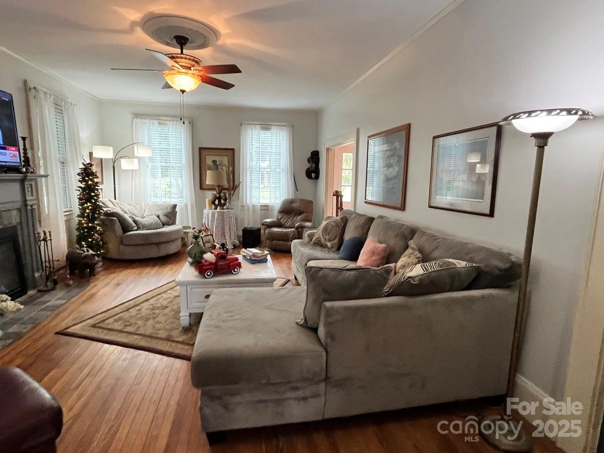 423 East Main Street Conway, NC 27820 - Photo 36 of 44 a living room with furniture and a large window